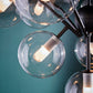 Matte Black Finish Bold 10-Glass Globe Pendant Light